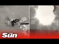 Dramatic moment Ukrainian drone strike wipes out Russian targets on Snake Island in aerial footage