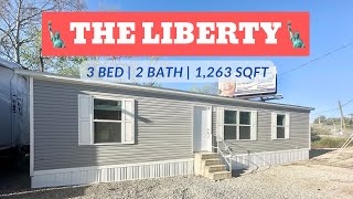 THE LIBERTY ! This mobile home offers an Open Floor Plan with a modern look!