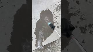 Melting ice with flame thrower.
