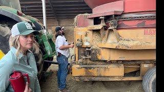 Grinding round bales with a Haybuster and John Deere 7R310