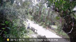 Neighbor throwing trash into canal 2