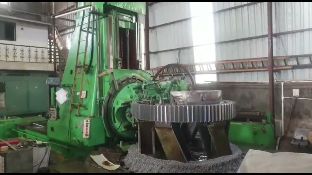 Tooth Hobbing Machine WMW gear hobbing machine performing teeth cutting operation on an ...