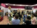 WATCH: Ed Sheeran surprises Florida high school students with free guitars, tickets