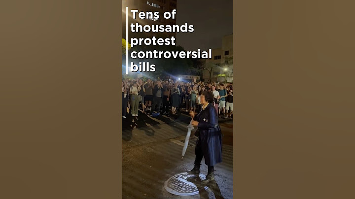 Tens of thousands protest controversial bills in Taipei