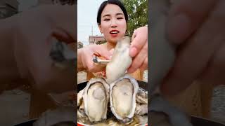 oyster challenge #asmreating #rawoysters #eatingsounds #short