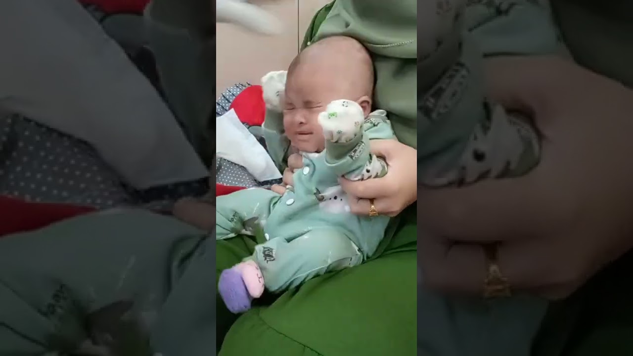 Craying..!! The saddest baby ear piercing