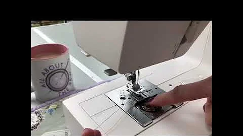 How to load a bobbin in a top loading Janome sewing machine