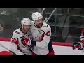 Tom Wilson scores a goal against the New Jersey Devils