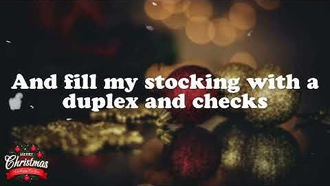 Thumbnail of Eartha Kitt - Santa Baby ( Lyrics Video )