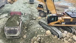 Caterpillar 385C Excavator Loading Trucks And Caterpillar Dumpers - Kivos Ate