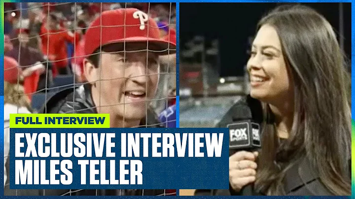 Philadelphia Phillies' fan Miles Teller talks with...