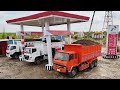 TIGA MOBIL TRUK GIGA, FUSO DAN HINO 500 MINIATUR PARKIR DI POMBENSIN