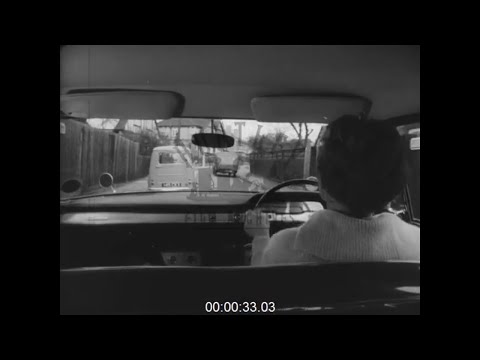 Driving and Putting on Stockings, 1960s - Film 1011401