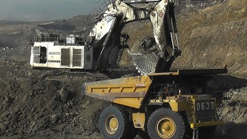 Unstoppable Power: Liebherr R 9350 Loading Overburden into Komatsu HD785 & CAT 777D Dump Trucks
