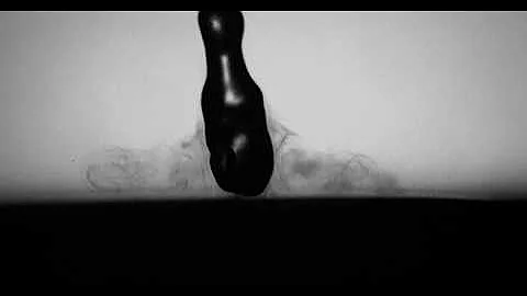 Water drop rebounds from dry ice (vortex ring)