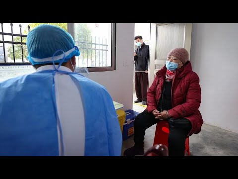 Clinics offer door-to-door services to combat covid-19 in rural areas of china