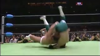 Jun Akiyama spikes Misawa with a nasty exploder