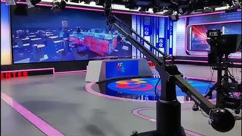 Feature of curvilinear motions of SEEDER robotic crane in Shanghai Chongming TV station