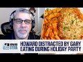 Gary eats during howards speech at the holiday party