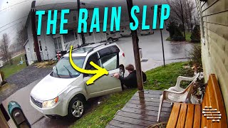 Guy Was Going to the Car Under Heavy Rain but Slipped Hilariously