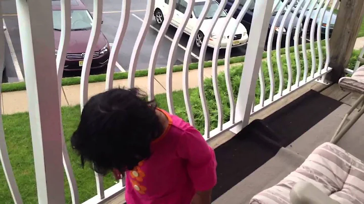 Zara playing in her balcony