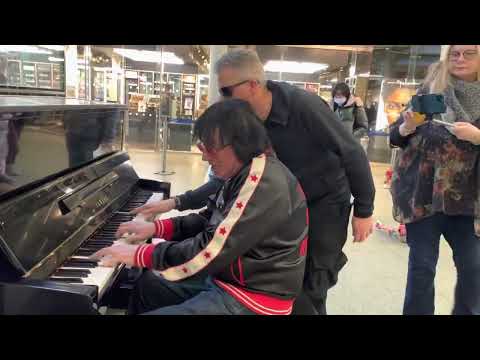 Old Timey Saloon Piano In A Modern Mall thumbnail