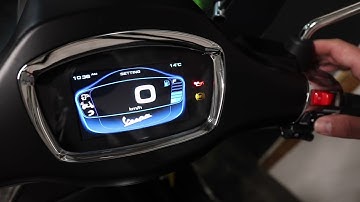 Navigating the settings menu on a Vespa Primavera Sport or Sprint Sport