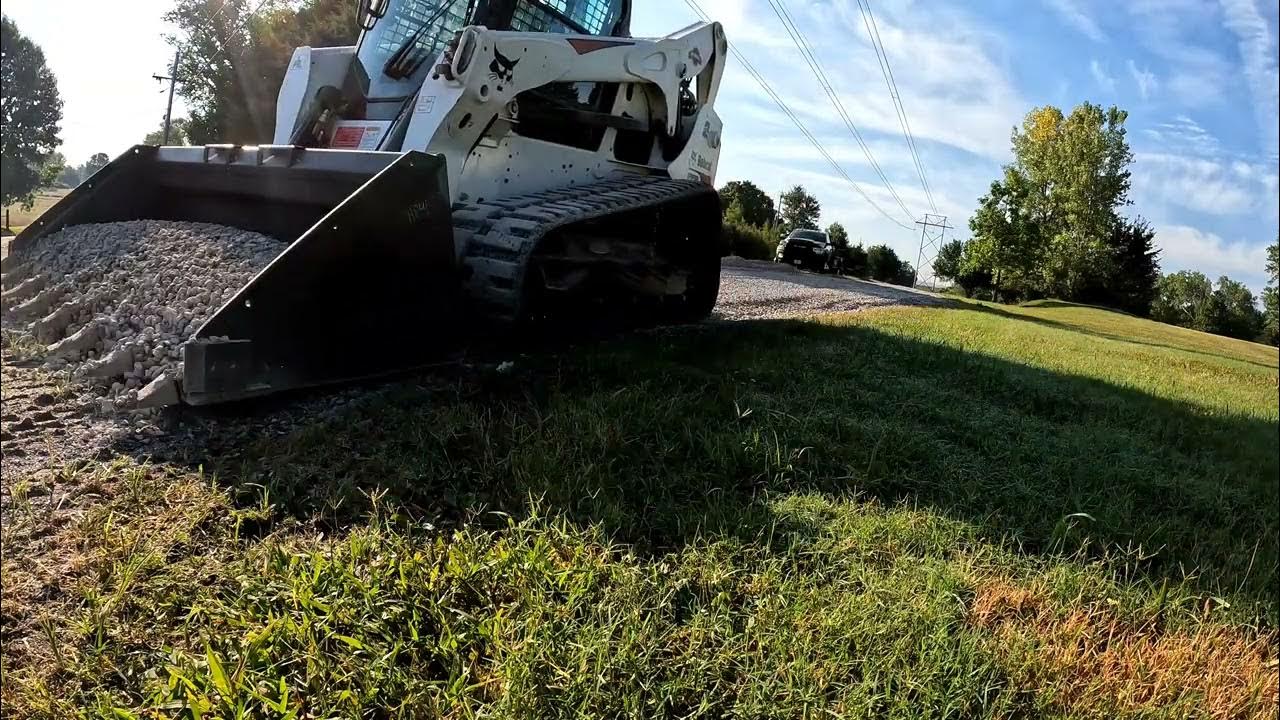 Spreading gravel with the Bobcat T770. YouTube