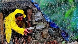 Camping under a strong storm building a survival shelter. Bushcraft. Camping in the rain