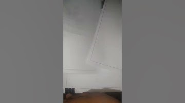 Q.6Two cross roads,each of Width 10m,cut at right angles through the centre of a rectangular park...