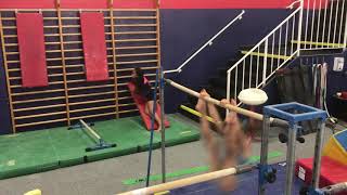 Cast straddle sole circle dismount (Orange Bars)