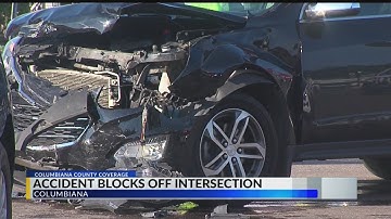 Columbiana intersection blocked off as police clean up after two-car crash