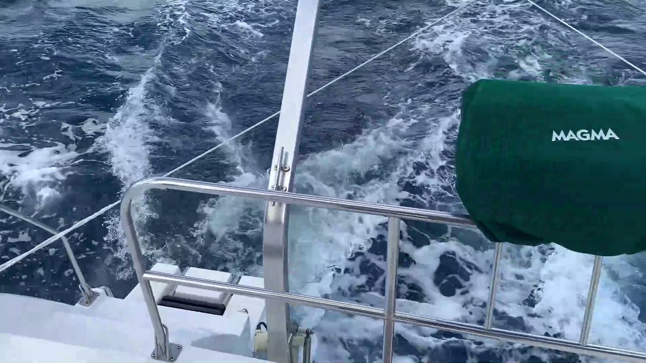 Towing dinghy in ocean calmer