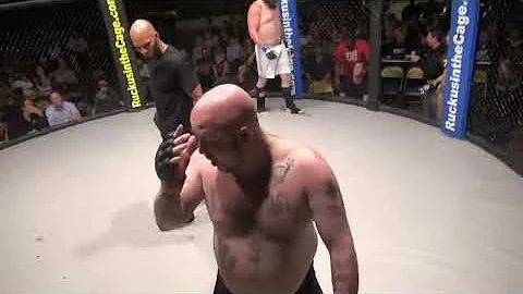 Fighter Craps All Over Cage Mat During Fight!