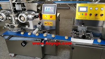 Encrusting machine for mooncake producing