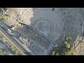 D-Log M. Bodrum, Turkey. Aerial perspective of antique performance venue on hillside. Ancient Bod...