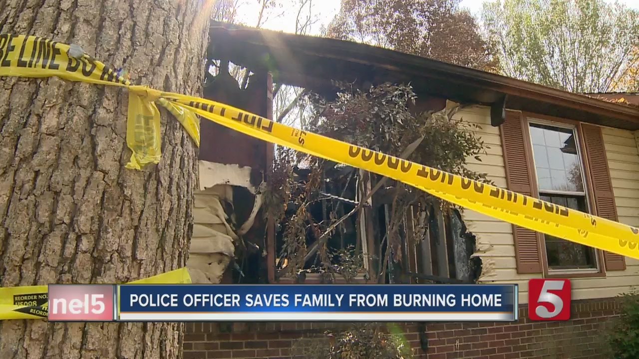 Officer Saves Family From Burning Home In Smyrna - YouTube