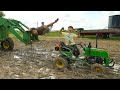 Hudson finds his kids tractors stuck in the mud  tractors for kids