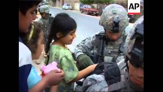 Embed pictures of US troops handing out Easter eggs screenshot 5
