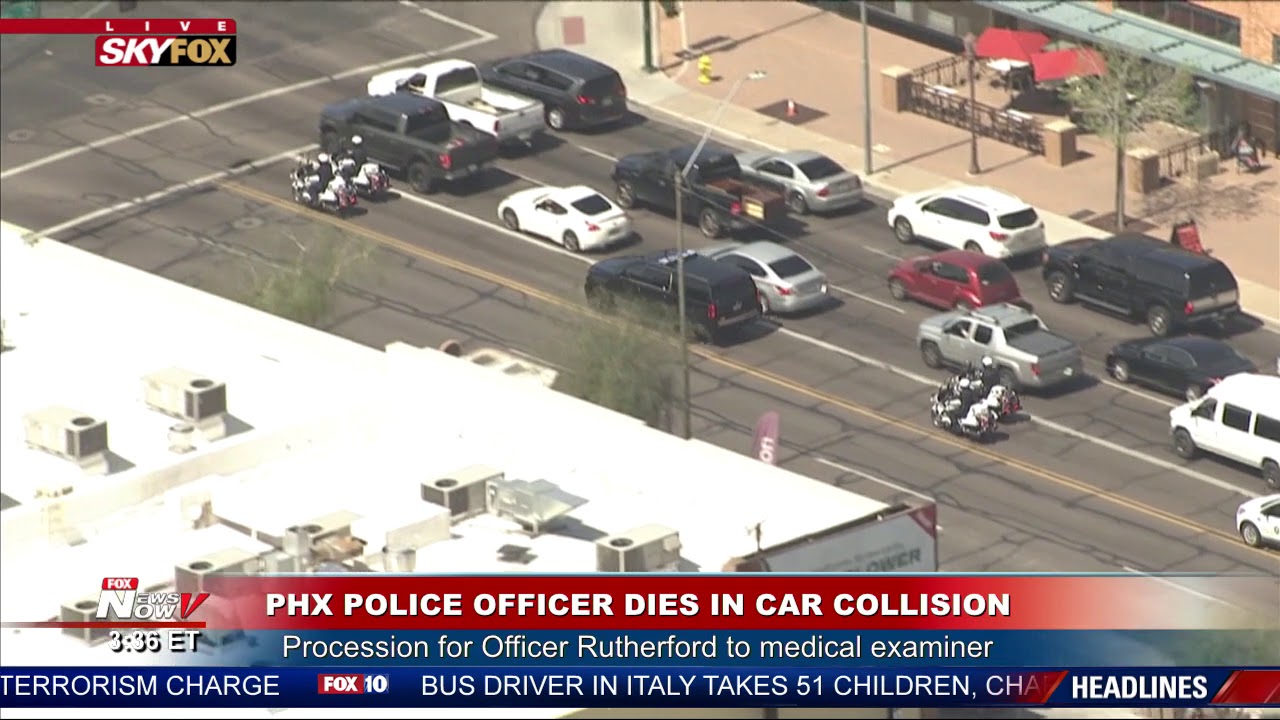 PROCESSION TO MEDICAL EXAMINER: Phoenix PD Officer Paul Rutherford ...