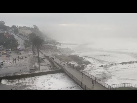 Massive waves pound California coastline, flooding streets