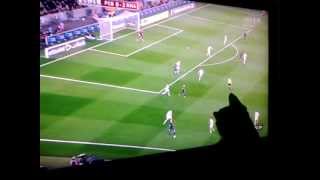 Cat watching football game - fc barcelona vs. real madrid and tries to
play