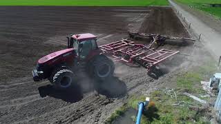 Case IH Magnum 340 towing disks and rollers