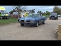 classic cars arriving at Newbury for wheels day