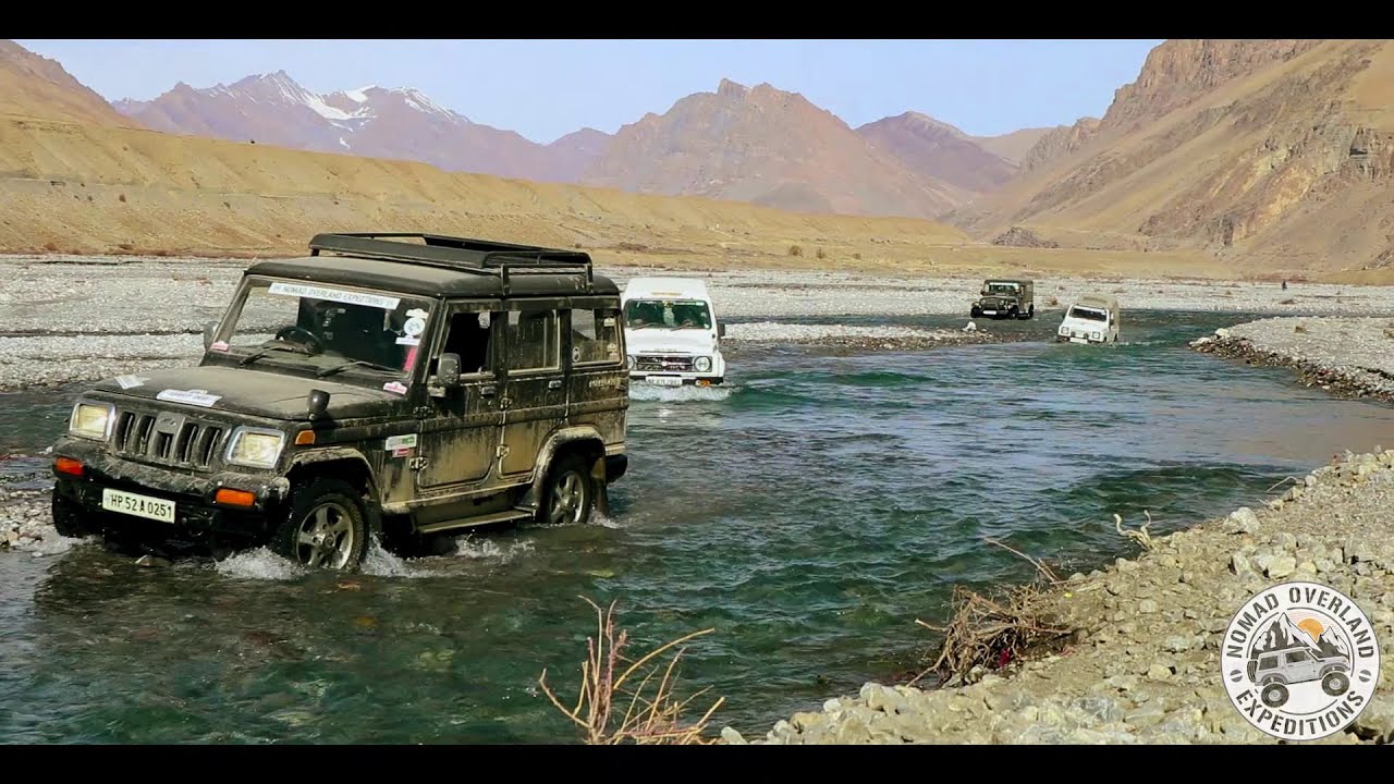 Crazy river crossing in Mahindra Thar, Mahindra Bolero and Maruti Gypsy.