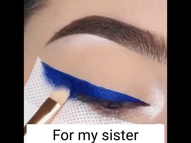 Doing blue eyeliner for my sister Shell class=