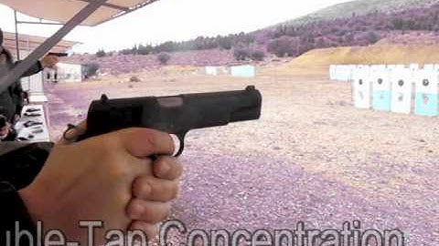 DPM PRESENT M 1911 RECOIL REDUCTION SYSTEM.WMV