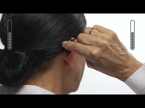 How to use the volume control in Oticon Xceed