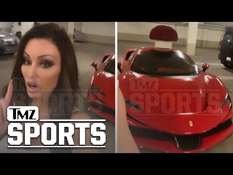 Oscar De La Hoya Gifts GF Holly Sonders Red Ferrari For Valentine's Day | TMZ Sports