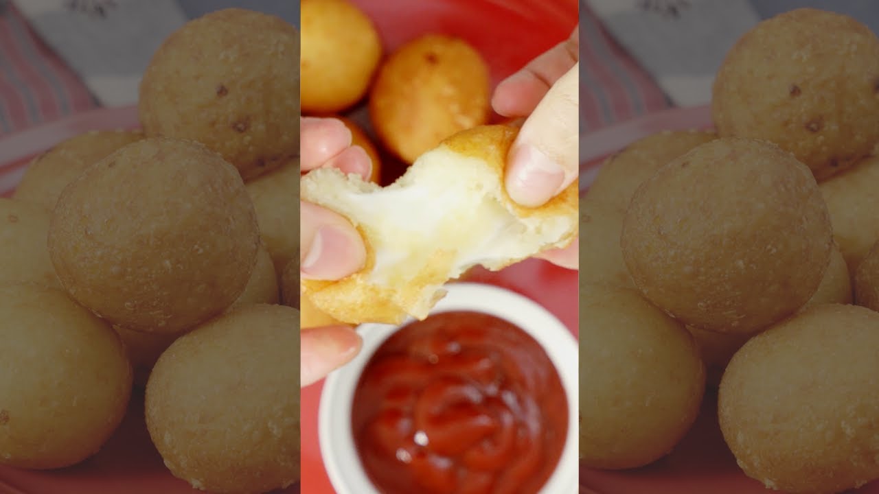 The CHEESIEST fried potato balls #shorts | Tastemade